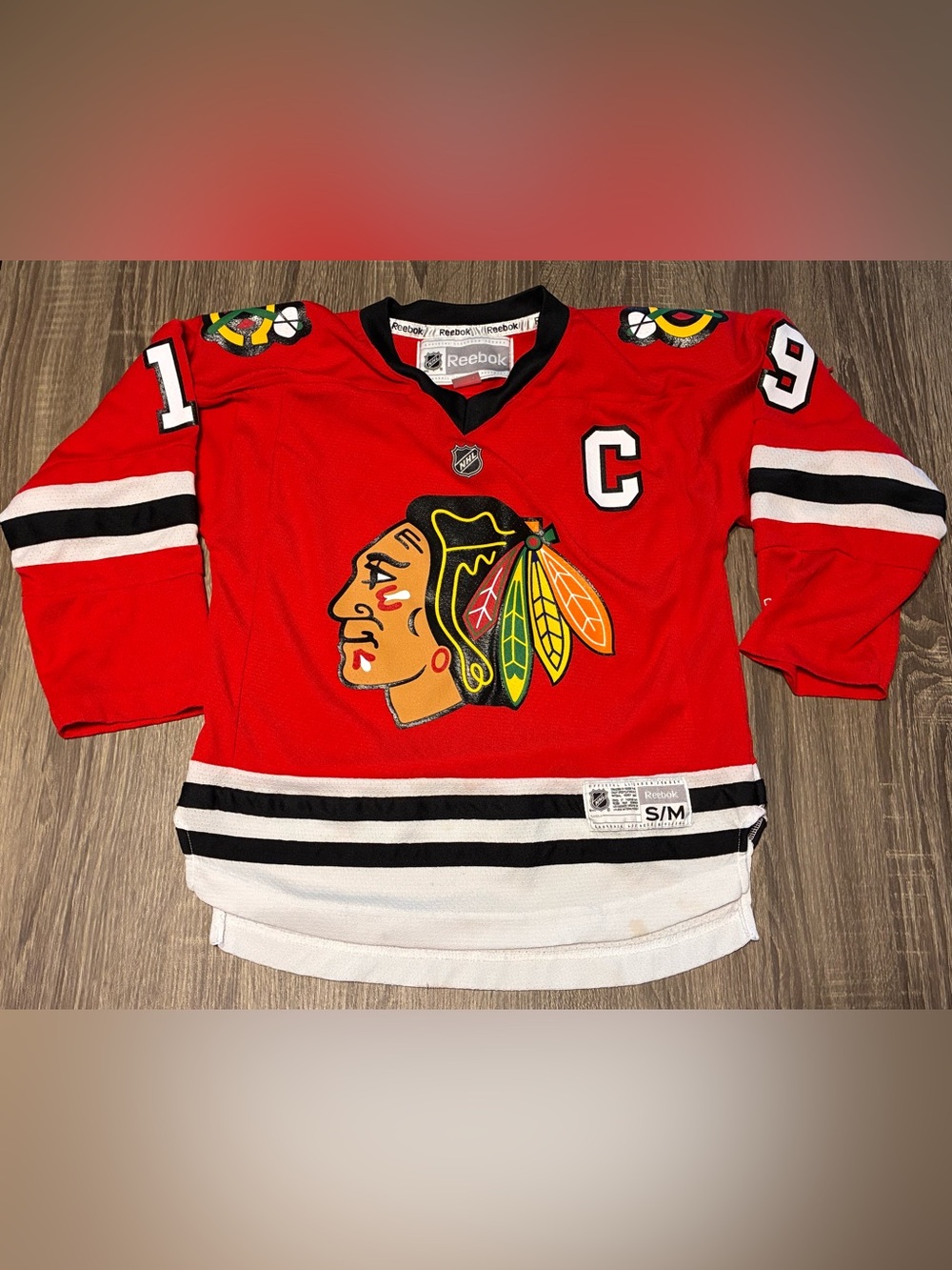 Reebok Chicago Blackhawks Jonathan Toews #19 C NHL  Hockey Jersey Youth Size S/M